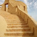 brown concrete stairs under blue sky during daytime