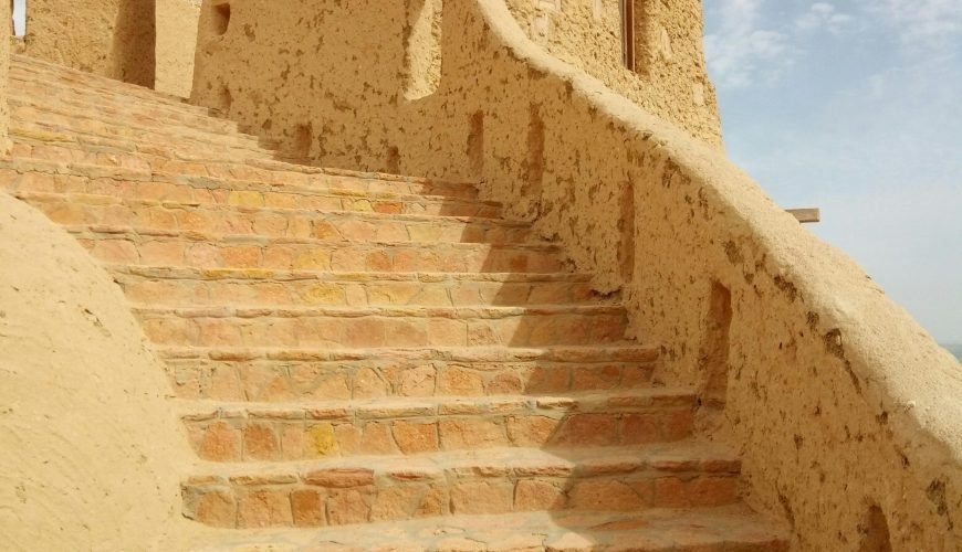 brown concrete stairs under blue sky during daytime